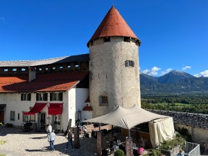 The Bled Castle courtyard has a cafe to buy drinks and look out over the view from the top of the cliff.