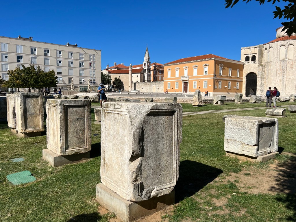 The forum in Zadar, Croatia, is an open archeological site where visitors walk among the remains of what was once a market and civic center. Image by JAG.